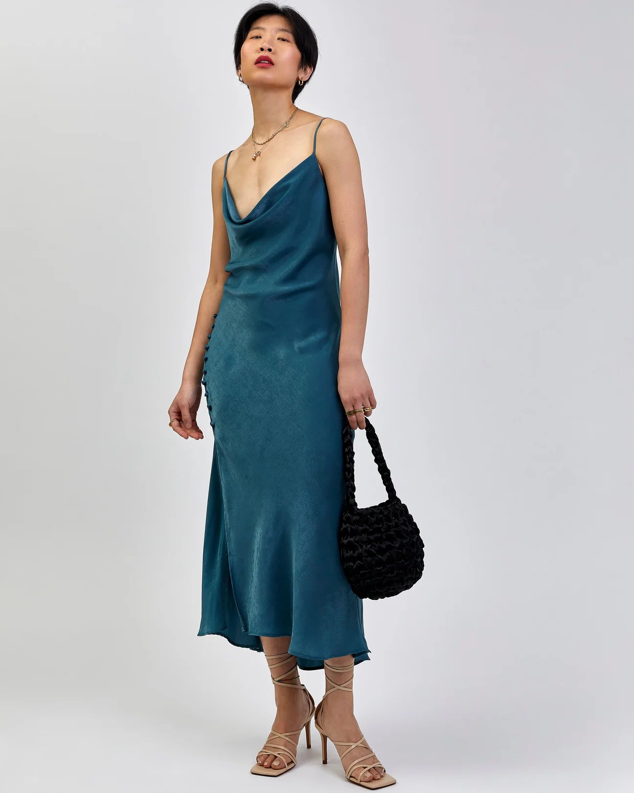 woman wearing Hive bridal handbag in black