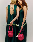 Load image into Gallery viewer, bridesmaids wearing Hive bridal handbag in hot pink

