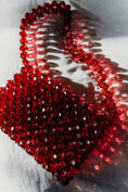 Load image into Gallery viewer, Red beaded bridal bag on a white surface
